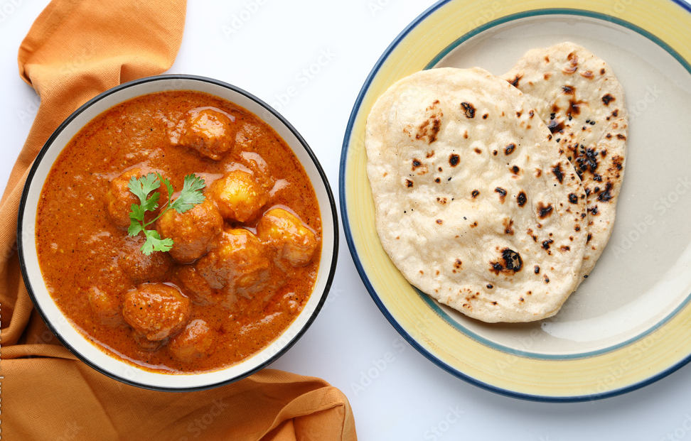 dum aloo or potato curry with butter nan tandoori roti