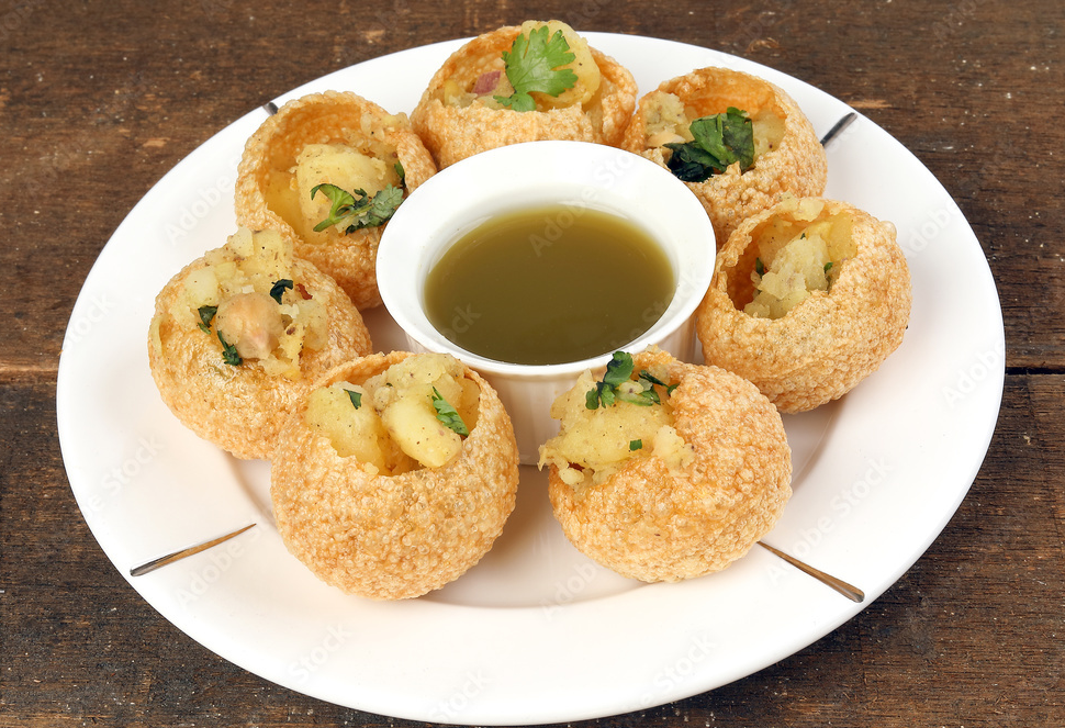 kokata street snack food chickpeas potato pani puri puchka with tamarind sauce