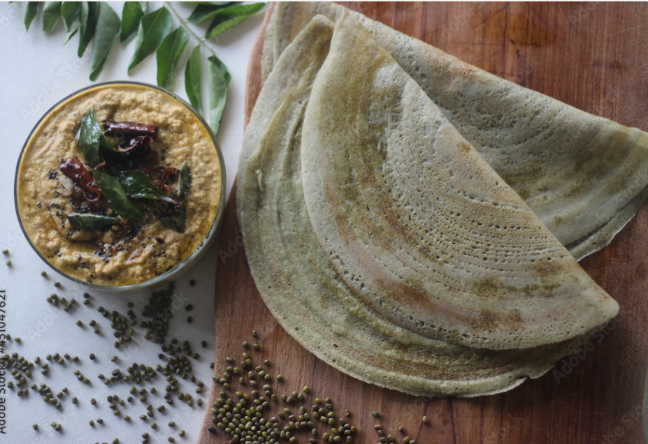 protein rich moong bean crepe, locally known as pesarattu. it looks like dosa but not made with fermented batter