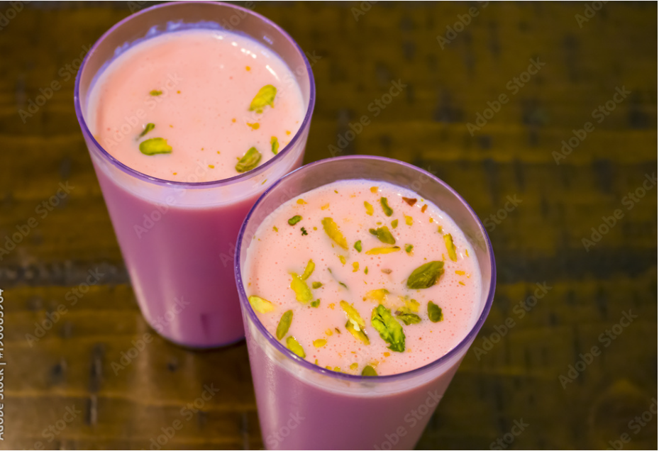 rose lassi drinks with pistachio shavings