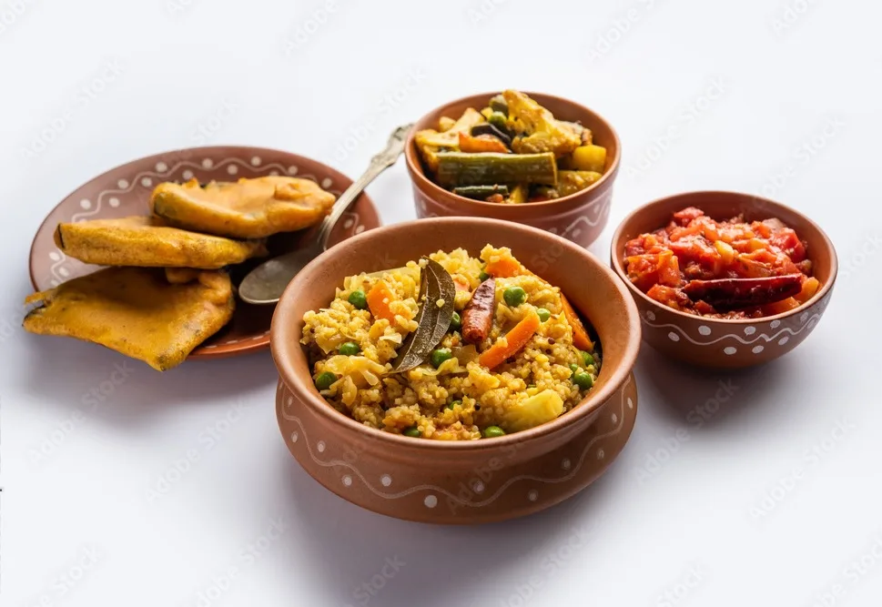 bengali bhog food for indian hindu durga puja or pooja festival. khichadi, labra, tomato chutney