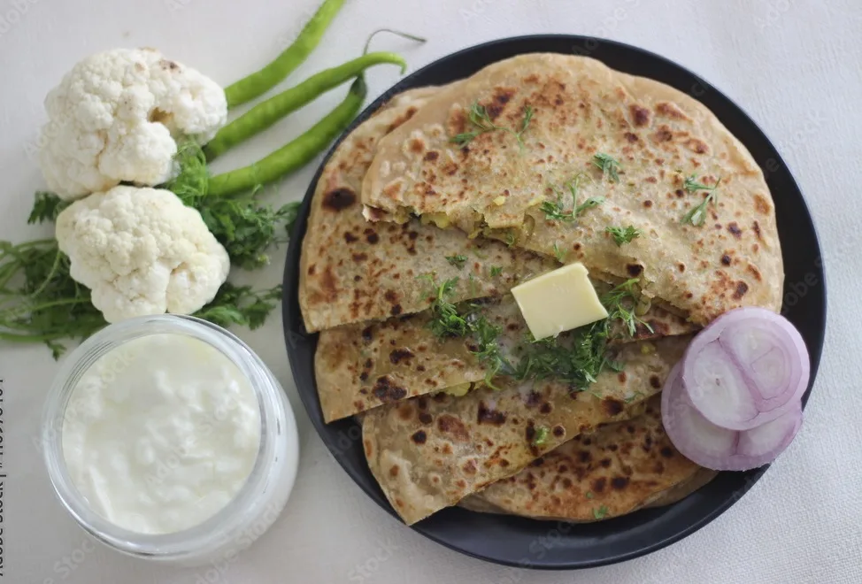 gobi paratha or cauliflower paratha is a type of paratha or parantha or flatbread, that is stuffed with flavoured cauliflower