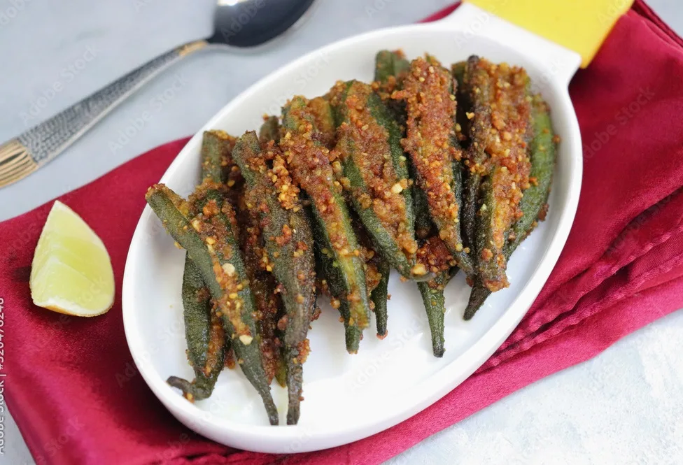 indian stuffed masala bhindi or okra or ladyfinger. served with lemon wedge. fried bhindi is perfect lunch or dinner dish