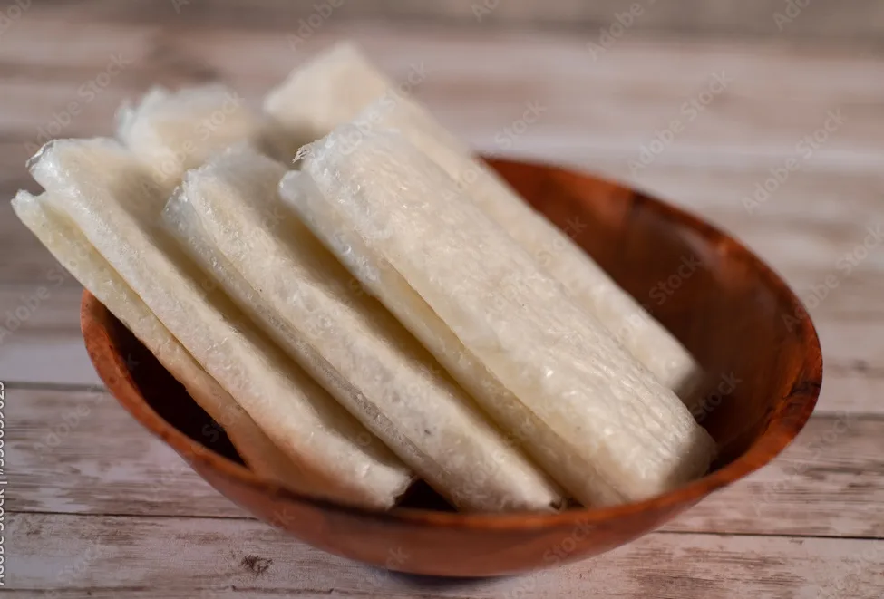 pootharekulu or putharekulu a famous sweet from andhra pradesh , india made with rice pure ghee and sugar.