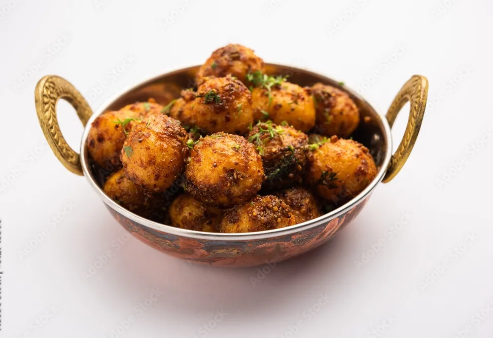 roasted bombay potatoes. pan fried little baby potatoes or aloo with jeera seeds