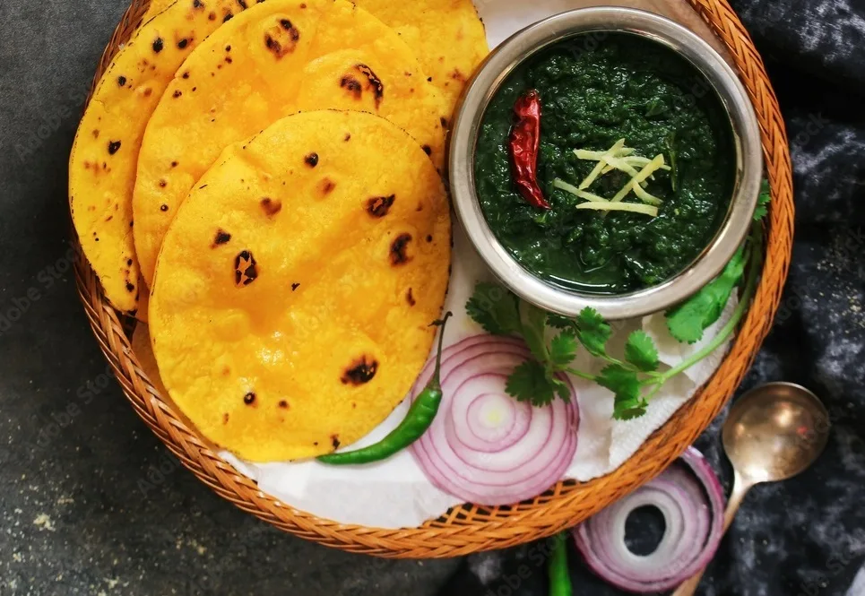 sarson ka saag and makki ki roti indian corn bread with mustard leaves gravy