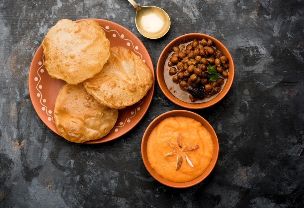 sooji halwa puri or shira poori with black chana masala breakfast