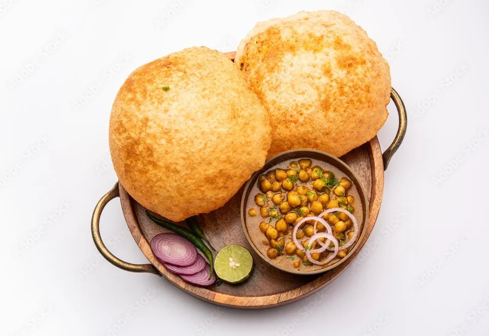 a north indian food dish. a combination of chana masala and bhatura or puri