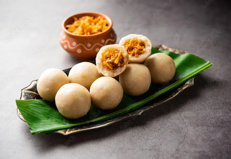 kozhukatta or kolukattai pidi is steamed dumplings made with rice flour, filling coconut, jaggery