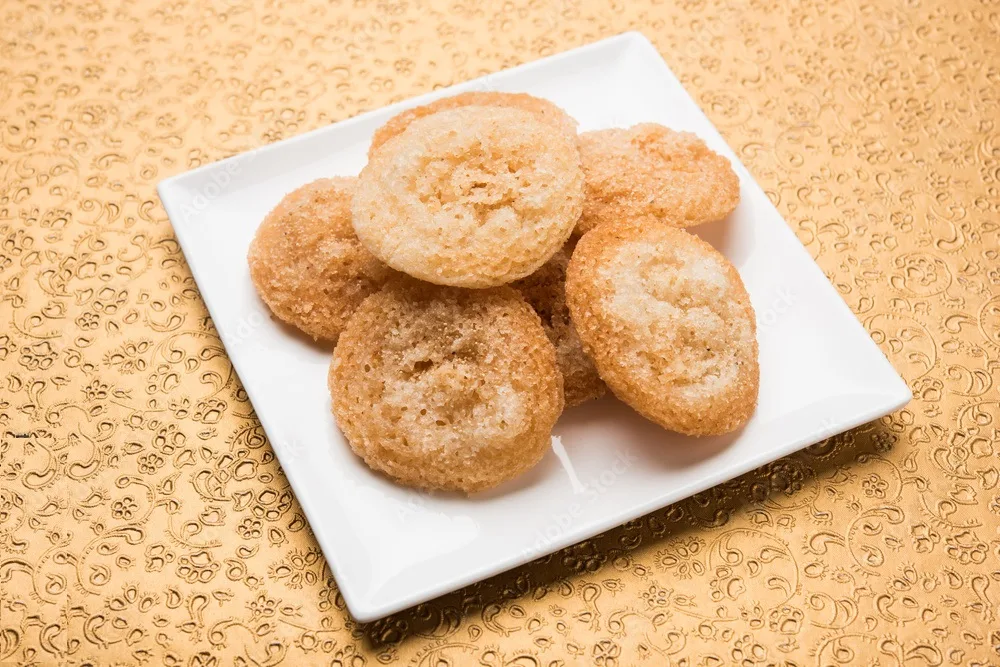 anarsa which is an authentic maharashtrian sweet pastry like dish especially made in the festive season in maharashtra and bihar