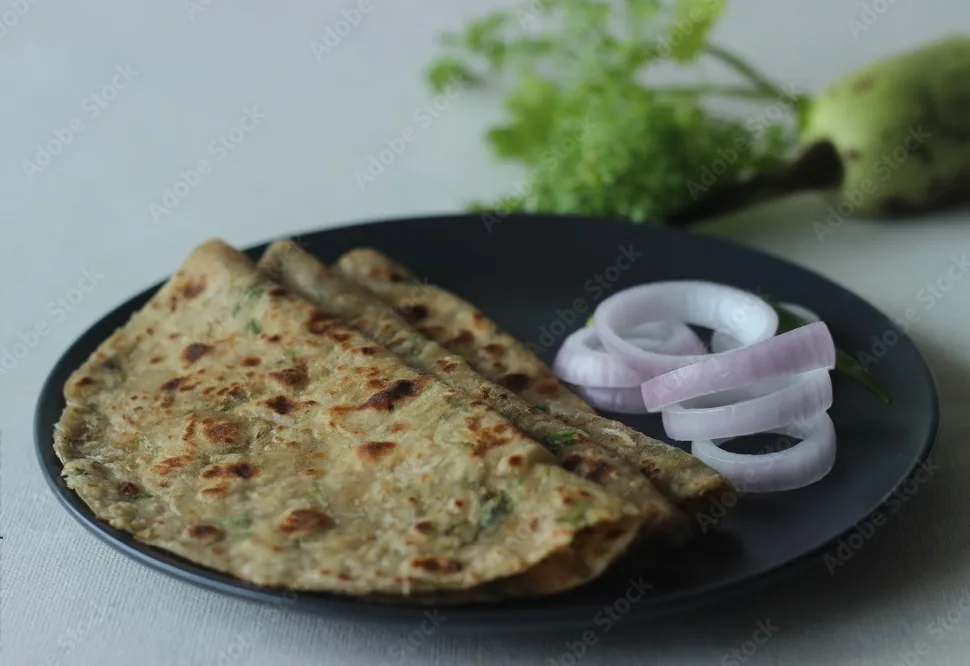 bottle gourd flatbread. indian flat bread made of whole wheat flour, grated bottle gourd and spices. popularly known as lauki ka paratha in india