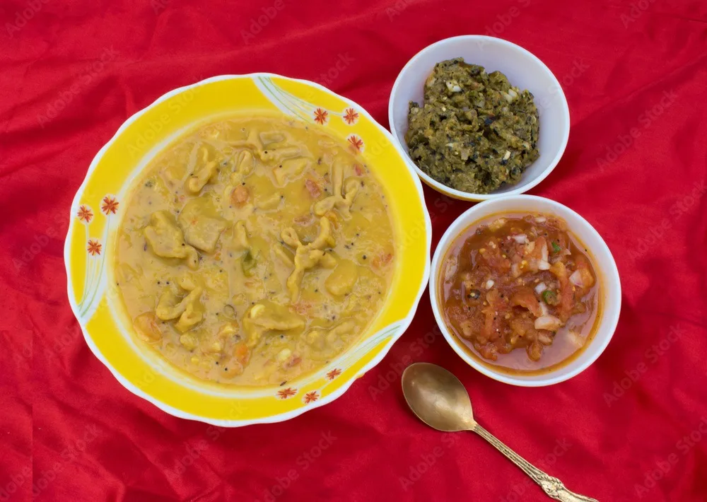 dal pithi of bihar, dal dhokli of gujarat, varan phal of rajasthan, chakolya of maharashtra with roasted tomato and parwal chutney or dip.