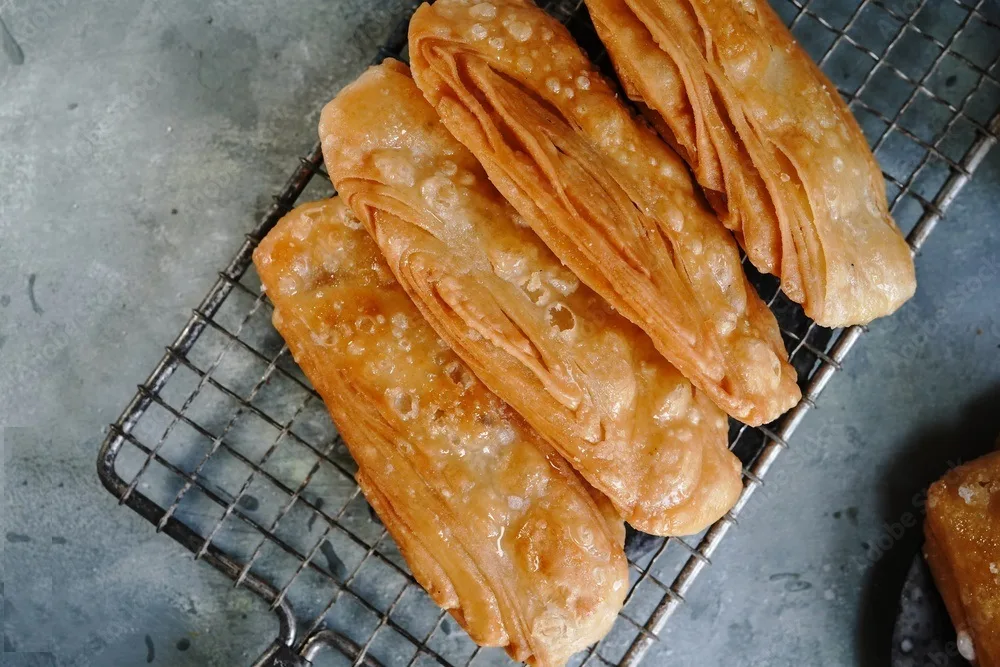 homemade indian sweet khaja chirote or madakku san