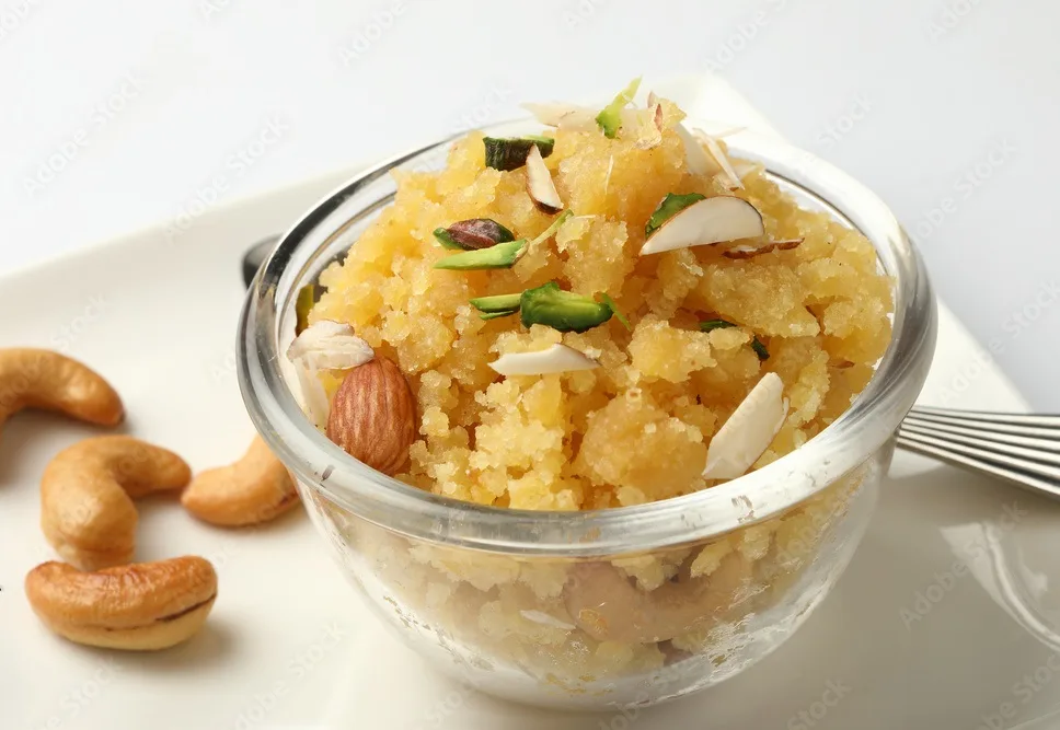 moong dal halwa is a classic indian sweet dish made with moong lentils, sugar, ghee and cardamom powder