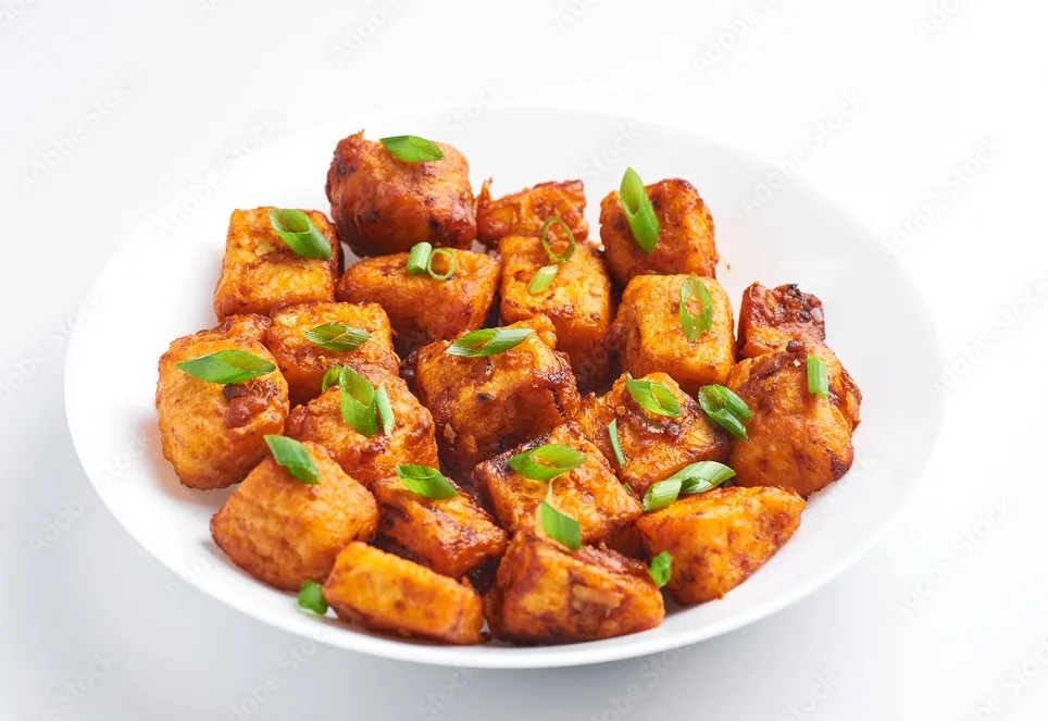 paneer 65 is indian chinese cuisine dish with panner cheese, tomatoes, onion, soy sauce.