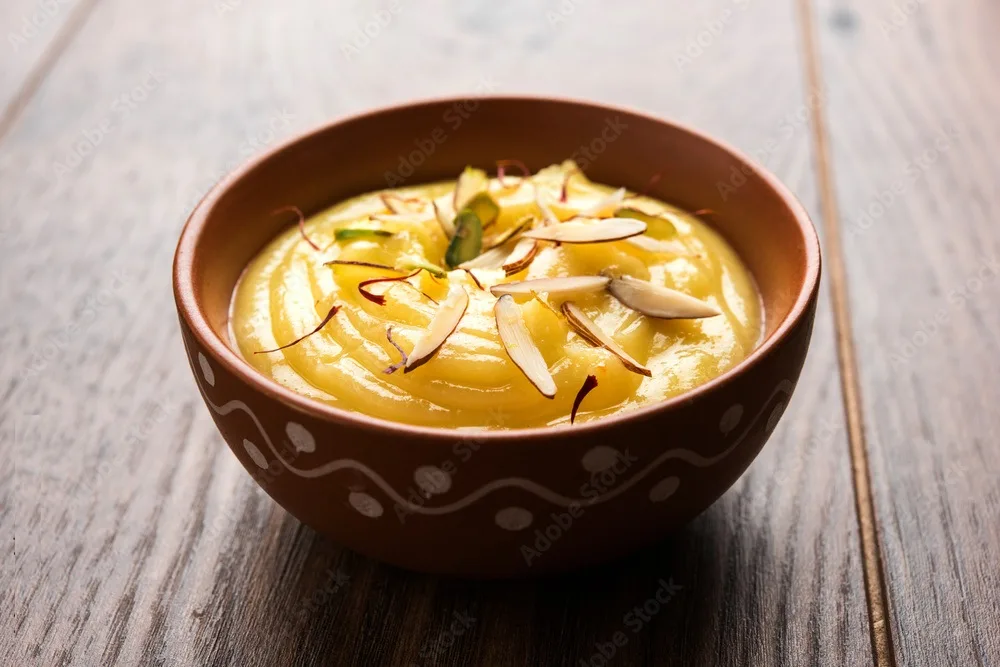 shrikhand or srikhand is an indian dessert made of strained yogurt, garnished with dry fruits and saffron