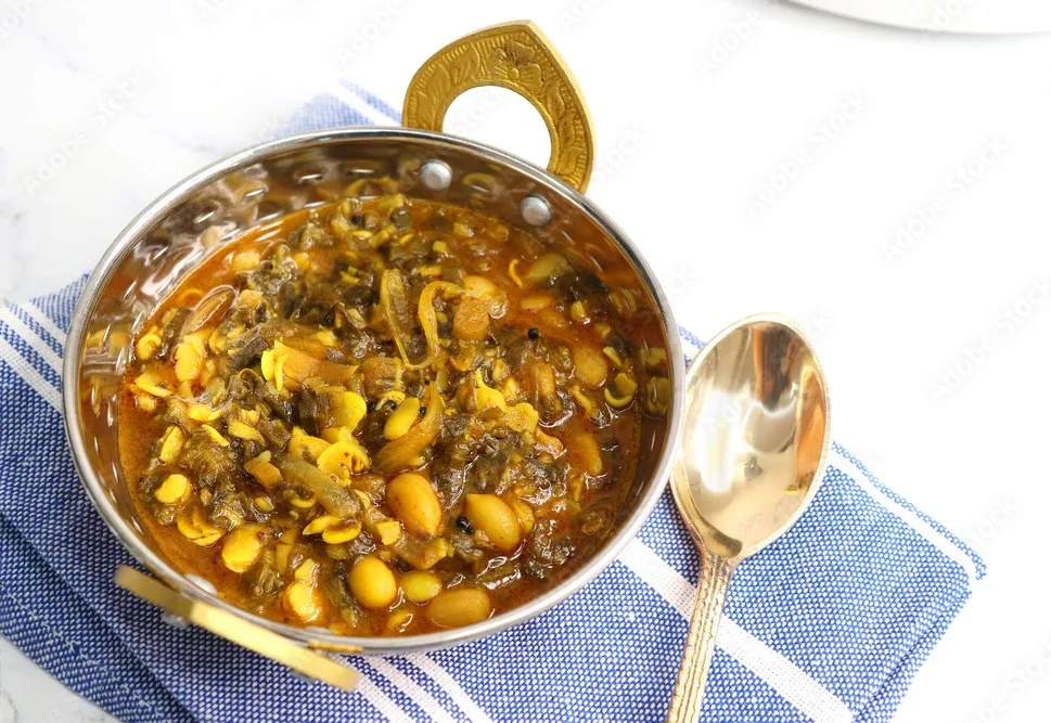 alu wal chi patal bhaji is a traditional, authentic maharashtrian dish. colocasia leaves and lima beans curry. it has a sweet and sour taste.